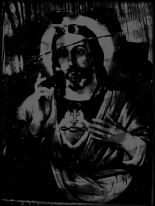 Graphic design of Jesus in black and grey with stripes