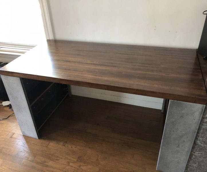 Concrete desk with shelves